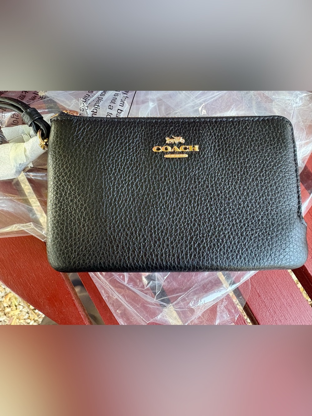 Coach Black Pebbled Leather Zip Wristlet with Gold Logo